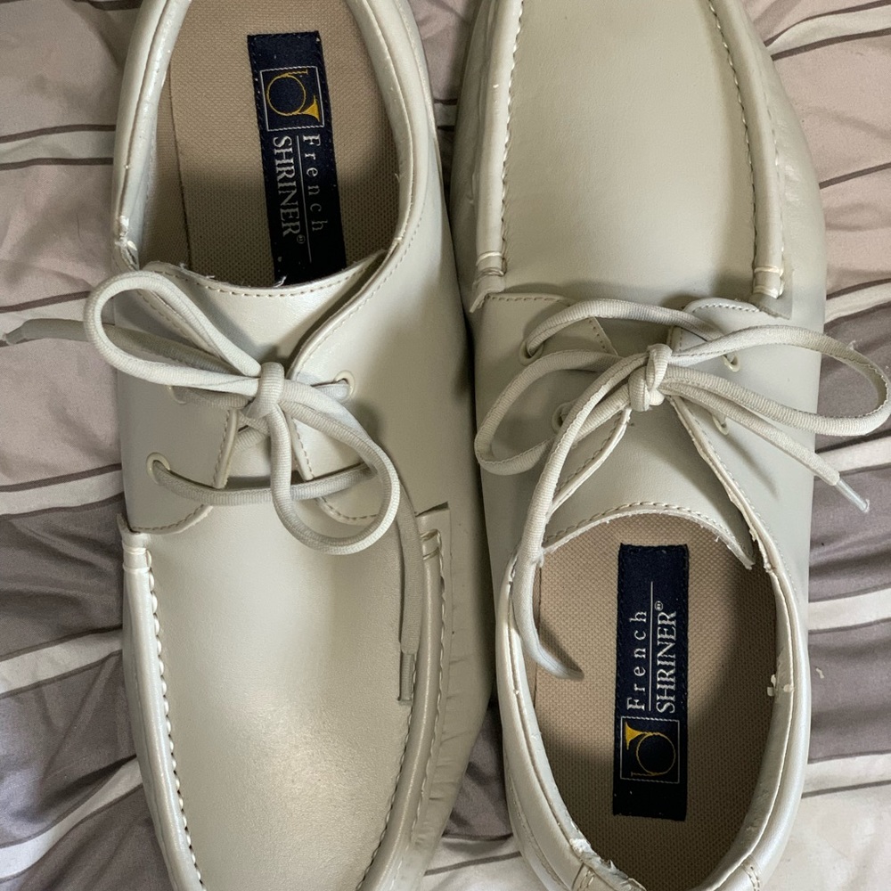 Lightly warn tan French shriner mens dress shoes.